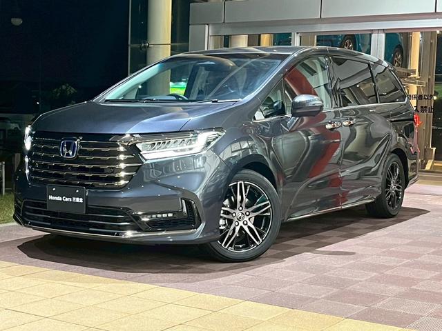 オデッセイハイブリッド ｅ：ＨＥＶアブソルート・ＥＸ　新車未登録　本革シート　１８インチアルミホイール　センターコンソールボックスワイヤレスチャージャートリプルゾーンコントロールフルオートエアコンディショナー（6枚目）