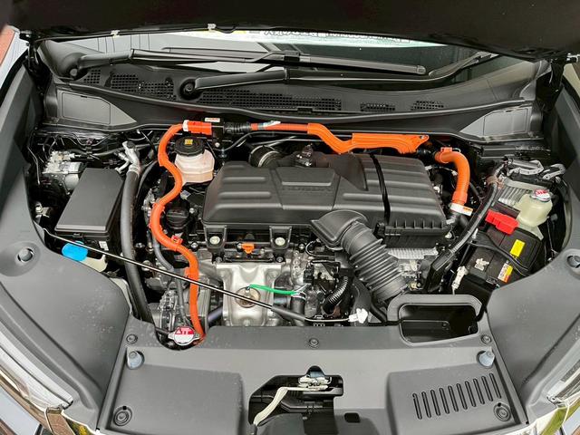 オデッセイハイブリッド ｅ：ＨＥＶアブソルート・ＥＸ　新車未登録　本革シート　１８インチアルミホイール　センターコンソールボックスワイヤレスチャージャートリプルゾーンコントロールフルオートエアコンディショナー（13枚目）
