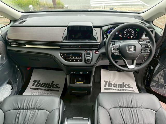 オデッセイハイブリッド ｅ：ＨＥＶアブソルート・ＥＸ　新車未登録　本革シート　１８インチアルミホイール　センターコンソールボックスワイヤレスチャージャートリプルゾーンコントロールフルオートエアコンディショナー（22枚目）
