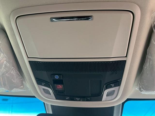 オデッセイハイブリッド ｅ：ＨＥＶアブソルート・ＥＸ　新車未登録　本革シート　１８インチアルミホイール　センターコンソールボックスワイヤレスチャージャートリプルゾーンコントロールフルオートエアコンディショナー（24枚目）