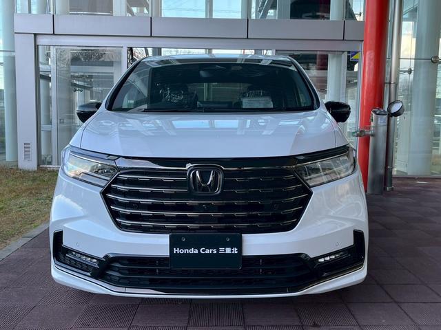 オデッセイハイブリッド ｅ：ＨＥＶアブソルート・ＥＸブラックエディション　純正１１インチナビゲーション装着　純正ＥＴＣ１．０装着　純正ブラックエンブレム装着　本革シート　１８インチアルミホイール　トリプルゾーンコントロールフルオートエアコンディショナー（2枚目）