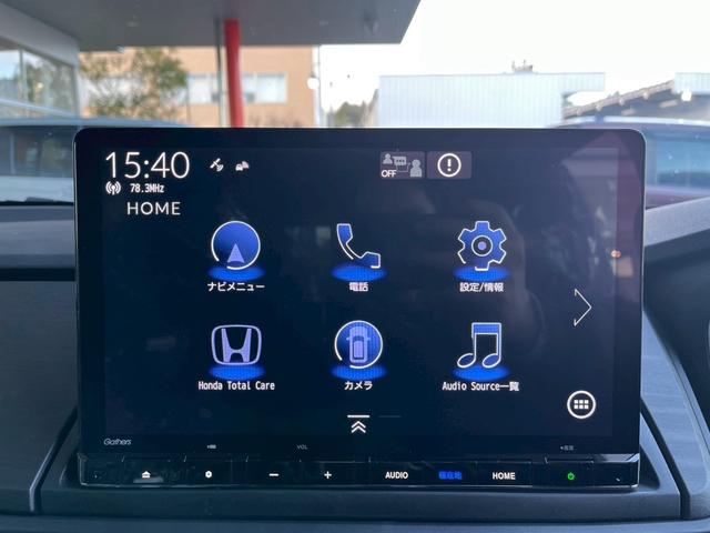 オデッセイハイブリッド ｅ：ＨＥＶアブソルート・ＥＸブラックエディション　純正１１インチナビゲーション装着　純正ＥＴＣ１．０装着　純正ブラックエンブレム装着　本革シート　１８インチアルミホイール　トリプルゾーンコントロールフルオートエアコンディショナー（20枚目）