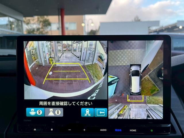 オデッセイハイブリッド ｅ：ＨＥＶアブソルート・ＥＸブラックエディション　純正１１インチナビゲーション装着　純正ＥＴＣ１．０装着　純正ブラックエンブレム装着　本革シート　１８インチアルミホイール　トリプルゾーンコントロールフルオートエアコンディショナー（23枚目）