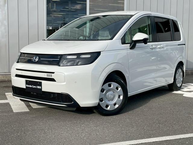 フリード e:HEVエアー 新車未登録 オーディオレス ETC シートバックテーブル 折りたたみテーブル 両側パワースライド サイドカーテンエアバック ホンダセンシング(4枚目)