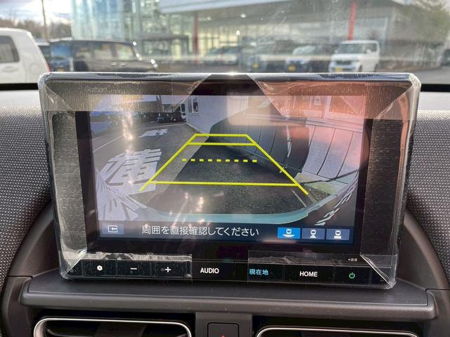 フリード ｅ：ＨＥＶエアー　ＥＸ　新車未登録　７人乗り　８インチナビ　Ｒカメラ　ＥＴＣ　社外前後ドラレコ　両側パワースライド　シートヒーター　両側パワースライド　サイドカーテンエアバック　ホンダセンシング（34枚目）