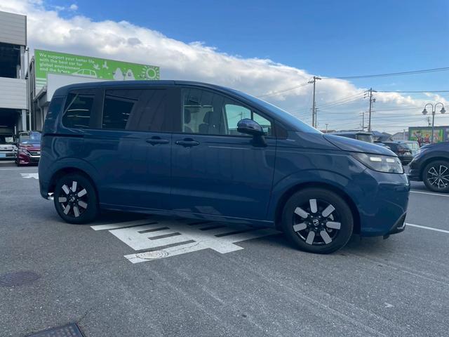 フリード ｅ：ＨＥＶエアー　ＥＸ　当店試乗車　純正１１．４インチコネクトナビ　マルチビューカメラ　ＥＴＣ　リアクーラー　運転席助手席シートヒーター　サイドカーテンエアバック　ホンダセンシング　両側パワースライド（6枚目）