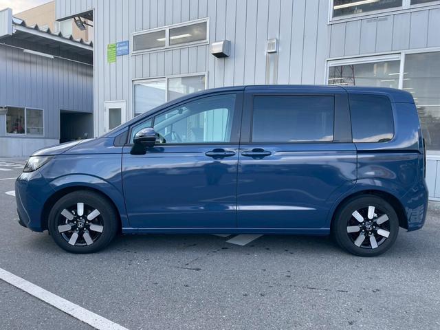 フリード ｅ：ＨＥＶエアー　ＥＸ　当店試乗車　純正１１．４インチコネクトナビ　マルチビューカメラ　ＥＴＣ　リアクーラー　運転席助手席シートヒーター　サイドカーテンエアバック　ホンダセンシング　両側パワースライド（8枚目）