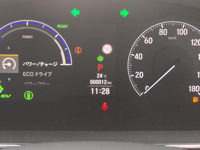 オデッセイハイブリッド ｅ：ＨＥＶアブソルート・ＥＸブラックエディション　新車　未登録車　ＥＴＣ　純正１１．４インチナビ　展示車　２列目両側アームレスト付４ウェイパワーシート　運転席＆助手席シートヒーター＋２列目シートヒーター　本革シート　１８インチアルミホイール（16枚目）