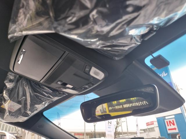 オデッセイハイブリッド ｅ：ＨＥＶアブソルート・ＥＸブラックエディション　新車　未登録車　ＥＴＣ　純正１１．４インチナビ　展示車　２列目両側アームレスト付４ウェイパワーシート　運転席＆助手席シートヒーター＋２列目シートヒーター　本革シート　１８インチアルミホイール（27枚目）