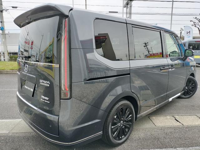 ステップワゴン eHEVスパーダプレミアムラインブラックエディション 新車 未登録車 展示車 オーディオレス マルチビューカメラシステム運転席&助手席&2列目シートヒーター 二列目オットマン コンビシート プレミアムラインブラックエディション(10枚目)