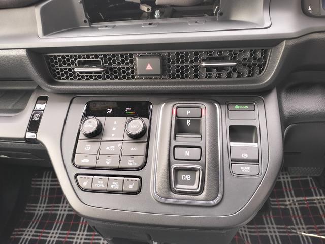 ステップワゴン eHEVスパーダプレミアムラインブラックエディション 新車 未登録車 展示車 オーディオレス マルチビューカメラシステム運転席&助手席&2列目シートヒーター 二列目オットマン コンビシート プレミアムラインブラックエディション(13枚目)