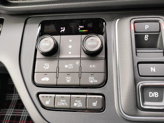 ステップワゴン eHEVスパーダプレミアムラインブラックエディション 新車 未登録車 展示車 オーディオレス マルチビューカメラシステム運転席&助手席&2列目シートヒーター 二列目オットマン コンビシート プレミアムラインブラックエディション(14枚目)