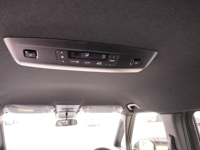 ステップワゴン eHEVスパーダプレミアムラインブラックエディション 新車 未登録車 展示車 オーディオレス マルチビューカメラシステム運転席&助手席&2列目シートヒーター 二列目オットマン コンビシート プレミアムラインブラックエディション(40枚目)