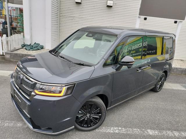 ステップワゴン eHEVスパーダプレミアムラインブラックエディション 新車 未登録車 展示車 オーディオレス マルチビューカメラシステム運転席&助手席&2列目シートヒーター 二列目オットマン コンビシート プレミアムラインブラックエディション(56枚目)