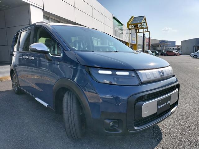 フリード クロスター 新車 展示車 ホンダディーラー販売 5人乗り クロスター オーディオレス 2列目6:4分割可倒式シート コンビシート 運転席&助手席シートヒーター 15インチアルミホイール ガソリン車 国内未登録車(7枚目)