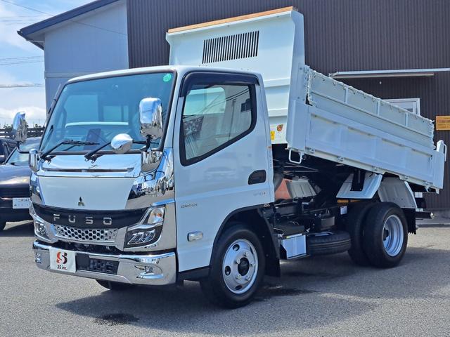 キャンター 全低床強化ダンプ　新型！リアビューカメラ　オリジナルステンレスバンパー　カーナビ　ＥＴＣ　全低床ダンプ　４ナンバー３ｔ強化ダンプ　純正メッキパーツ　中外可動式コボレーン　中間ピン装備　オーバーヘッドシェルフ（14枚目）