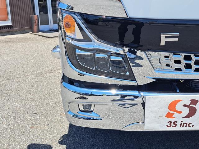 キャンター 全低床強化ダンプ　新型！リアビューカメラ　オリジナルステンレスバンパー　カーナビ　ＥＴＣ　全低床ダンプ　４ナンバー３ｔ強化ダンプ　純正メッキパーツ　中外可動式コボレーン　中間ピン装備　オーバーヘッドシェルフ（19枚目）