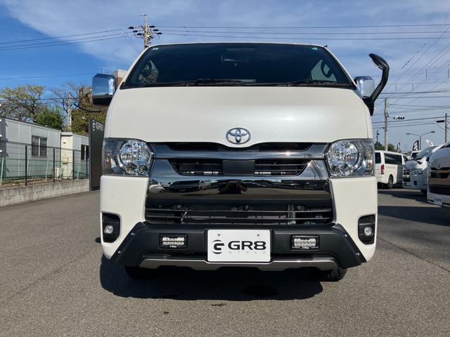 ハイエースバン スーパーＧＬ　ダークプライムＩＩ　登録済未使用車／４ＷＤ／寒冷地仕様／ＡＬＰＩＮＥ　ＢＩＧＤＡ／ＨＤＭＩ／ＥＴＣ／パノラミックビューＭ／デジタルインナーＭ／ＴＲＤフロントスポイラー／１６ｉｎアルミ／両側パワースライドドア／ベッドキット（21枚目）