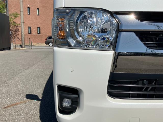 ハイエースバン スーパーＧＬ　ダークプライムＩＩ　Ｋｅｎｗｏｏｄフローティングナビ／バックカメラ／パノラミックビューＭ／デジタルインナーミラー／ＧＲ８センターコンソール／シートカバー／クリアランスソナー／ＡＣ１００Ｖ電源／ベッドキット／ヒッチメンバー（2枚目）