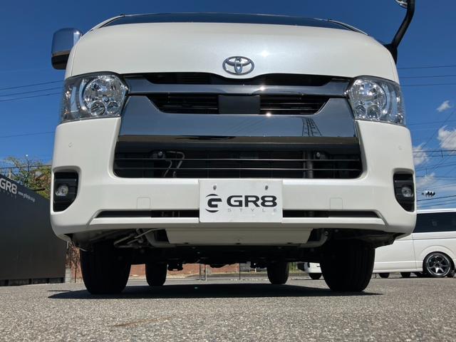 ハイエースバン スーパーＧＬ　ダークプライムＩＩ　Ｋｅｎｗｏｏｄフローティングナビ／バックカメラ／パノラミックビューＭ／デジタルインナーミラー／ＧＲ８センターコンソール／シートカバー／クリアランスソナー／ＡＣ１００Ｖ電源／ベッドキット／ヒッチメンバー（33枚目）