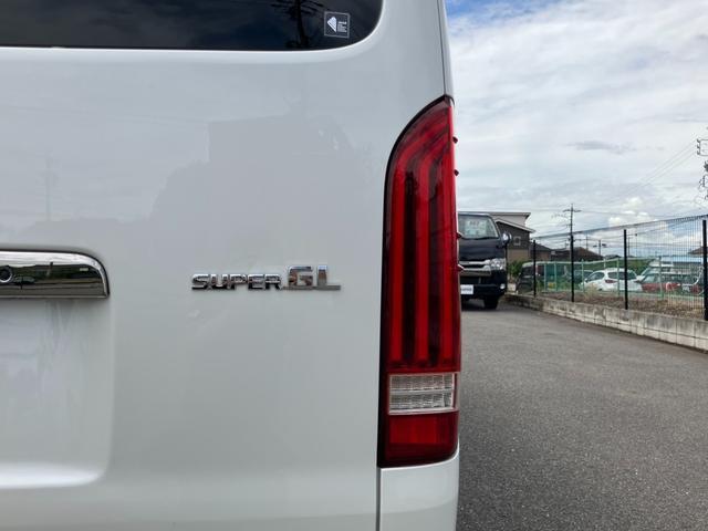 ハイエースバン スーパーＧＬ　ダークプライムＩＩ　１オーナー／ＡＬＰＩＮＥ　ＢＩＧＸ／Ｂカメラ／フリップダウンモニター／ＥＳＳＥＸフロントスポイラー／１７ｉｎＡＷ／ローダウン／両側電動スライドドア／ＬＥＤテール／ＧＲ８センターコンソール／ベッドキット（38枚目）