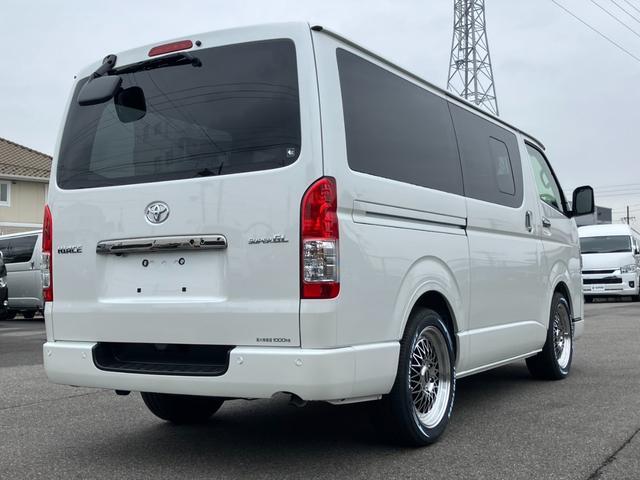 ハイエースバン スーパーGL ダークプライムII ALPINE BIGDA/Bカメラ/HDMI/ETC/トヨタセーフティーセンス/LEDヘッドライト/GR8フロントスポイラー/ESSEX18inアルミ/センターコンソール/シートカバー/ベッドキット(11枚目)