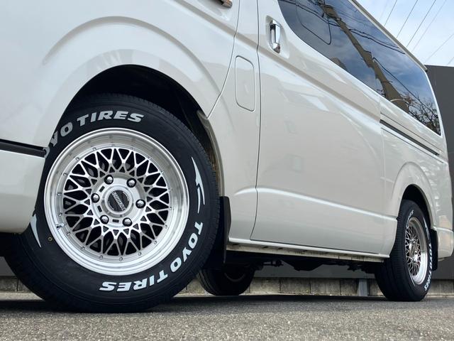 ハイエースバン スーパーGL ダークプライム 1オーナー/ナビTV/Bluetoothバックカメラ/ETC/AC100V電源/フロントスポイラー/16inアルミホイール/LEDヘッドライト/スマートキー/センターカーテン/新品ベッドキット(14枚目)