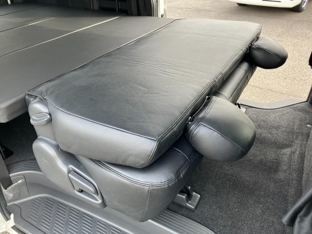 ハイエースバン スーパーGL ダークプライム 1オーナー/ナビTV/Bluetoothバックカメラ/ETC/AC100V電源/フロントスポイラー/16inアルミホイール/LEDヘッドライト/スマートキー/センターカーテン/新品ベッドキット(54枚目)