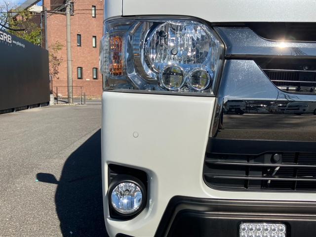 ハイエースバン スーパーＧＬ　ダークプライムＩＩ　４ＷＤ／寒冷地仕様／ナビＴＶ／バックカメラ／ＥＴＣ／パノラミックビューモニター／デジタルインナーミラー／フロントスポイラー／１６ｉｎアルミ／シートカバー／ＬＥＤヘッドライト／床張りキット／ベッドキット（13枚目）