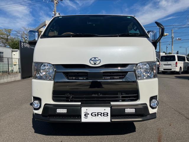 ハイエースバン スーパーＧＬ　ダークプライムＩＩ　４ＷＤ／寒冷地仕様／ナビＴＶ／バックカメラ／ＥＴＣ／パノラミックビューモニター／デジタルインナーミラー／フロントスポイラー／１６ｉｎアルミ／シートカバー／ＬＥＤヘッドライト／床張りキット／ベッドキット（21枚目）