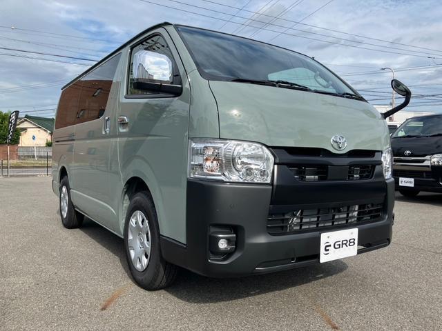 ハイエースバン ロングスーパーＧＬ　アースカラーパッケージ　新車未登録／ＡＬＰＩＮＥ　ＢＩＧＸ／ＨＤＭＩ／Ｂカメラ／フリップダウンモニター／デジタルインナーＭ／パノラミックビューＭ／両側電動スライドドア／クリアランスソナー／ＬＥＤヘッド（9枚目）