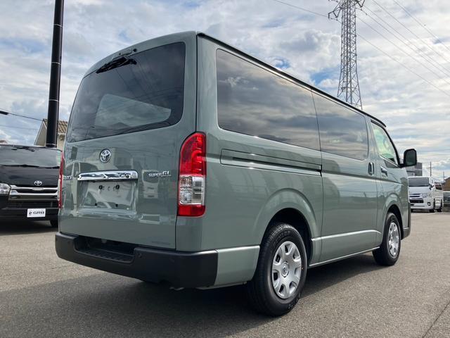 ハイエースバン ロングスーパーＧＬ　アースカラーパッケージ　新車未登録／ＡＬＰＩＮＥ　ＢＩＧＸ／ＨＤＭＩ／Ｂカメラ／フリップダウンモニター／デジタルインナーＭ／パノラミックビューＭ／両側電動スライドドア／クリアランスソナー／ＬＥＤヘッド（11枚目）