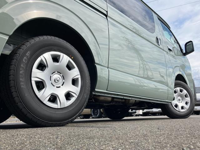 ハイエースバン ロングスーパーＧＬ　アースカラーパッケージ　新車未登録／ＡＬＰＩＮＥ　ＢＩＧＸ／ＨＤＭＩ／Ｂカメラ／フリップダウンモニター／デジタルインナーＭ／パノラミックビューＭ／両側電動スライドドア／クリアランスソナー／ＬＥＤヘッド（28枚目）