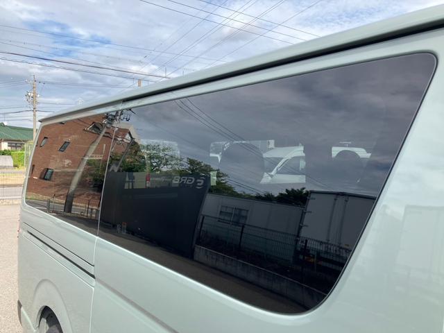 ハイエースバン ロングスーパーＧＬ　アースカラーパッケージ　新車未登録／ＡＬＰＩＮＥ　ＢＩＧＸ／ＨＤＭＩ／Ｂカメラ／フリップダウンモニター／デジタルインナーＭ／パノラミックビューＭ／両側電動スライドドア／クリアランスソナー／ＬＥＤヘッド（36枚目）