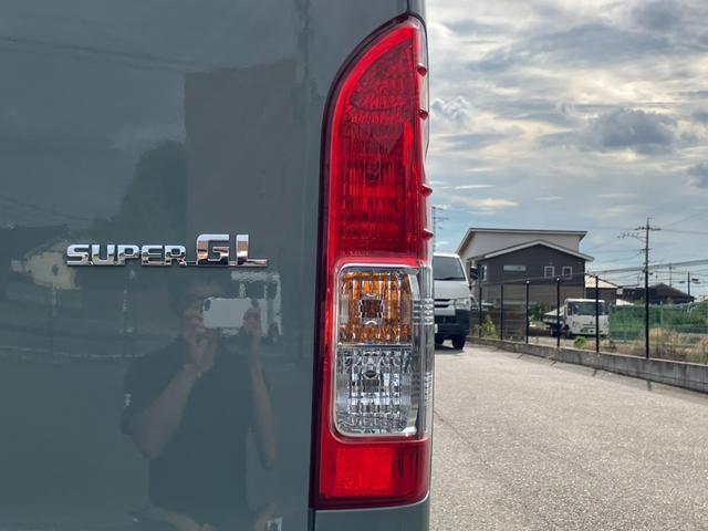 ハイエースバン ロングスーパーＧＬ　アースカラーパッケージ　新車未登録／ＡＬＰＩＮＥ　ＢＩＧＸ／ＨＤＭＩ／Ｂカメラ／フリップダウンモニター／デジタルインナーＭ／パノラミックビューＭ／両側電動スライドドア／クリアランスソナー／ＬＥＤヘッド（41枚目）