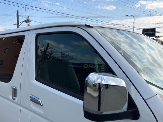 ハイエースバン スーパーＧＬ　ダークプライムＩＩ　１オーナー／ＰａｎａｓｏｎｉｃフローティングナビＴＶ／バックカメラ／パノラミックビューモニター／両側パワースライドドア／ＴＲＤフロントスポイラー／１６ｉｎアルミ／クリアランスソナー／ベッドキット（34枚目）