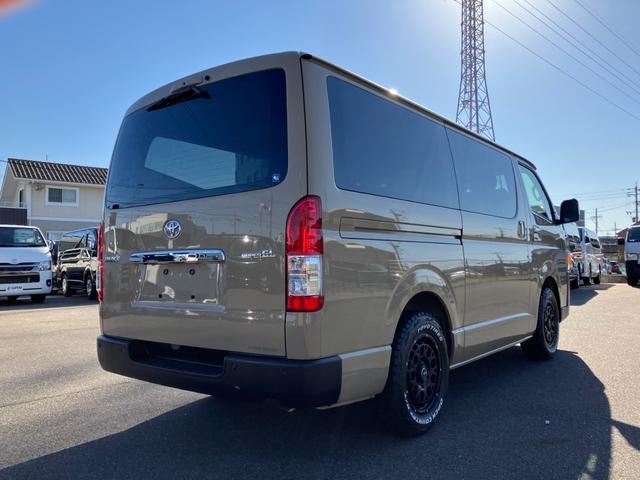 ハイエースバン ロングスーパーＧＬ　新車未登録／アースカラーＰＫＧ／ＡＬＰＩＮＥ　ＢＩＧＸ／ＨＤＭＩ／ＥＴＣ／Ｂカメラ／両側電動スライドドア／パノラミックビューＭ／デジタルインナーＭ／ＪＡＯＳバンパーガード／１６ｉｎＡＷ／ベッドキット（11枚目）