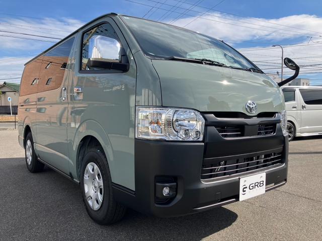 ハイエースバン ロングスーパーGL アースカラーパッケージ 登録済未使用車/寒冷地仕様/デジタルインナM/パノラミックビューM/両側電動スライドドア/クリアランスソナー/LEDヘッドライト/AC100V電源/20周年記念スカッフプレート(9枚目)