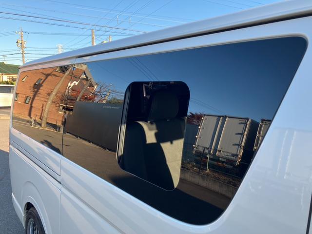 ハイエースバン スーパーＧＬ　ダークプライムＩＩ　１オーナー／ナビＴＶ／バックカメラ／ＥＴＣ／パノラミックビューモニター／デジタルインナーミラー／インナーブラックヘッドライト／フロントスポイラー／ＡＣ１００Ｖ電源／１８ｉｎアルミ／ベッドキット（37枚目）