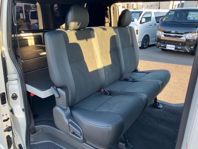 ハイエースバン スーパーＧＬ　ダークプライムＩＩ　１オーナー／ナビＴＶ／バックカメラ／ＥＴＣ／パノラミックビューモニター／デジタルインナーミラー／インナーブラックヘッドライト／フロントスポイラー／ＡＣ１００Ｖ電源／１８ｉｎアルミ／ベッドキット（62枚目）