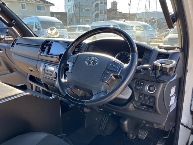 ハイエースバン スーパーGL ダークプライムII ナビTV/バックカメラ/ETC/両側パワースライドドア/17インチアルミ/ローダウン/大型コンソールボックス/デジタルインナーミラー/AC100V電源/トヨタセーフティーセンス/ベッドキット(48枚目)