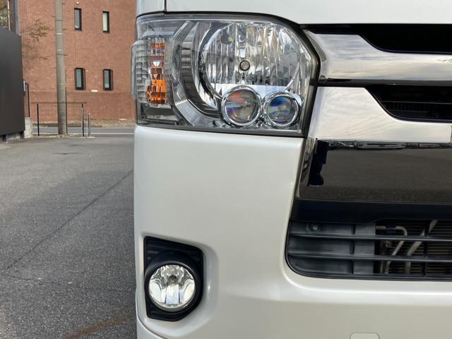 ハイエースバン スーパーGL ダークプライム 1オーナー/ナビTV/Bluetoothバックカメラ/ETC/AC100V電源/フロントスポイラー/16inアルミホイール/LEDヘッドライト/スマートキー/センターカーテン/新品ベッドキット(13枚目)