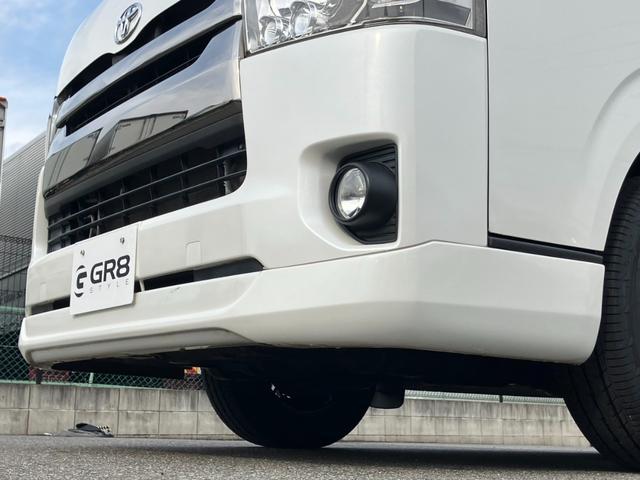 ハイエースバン スーパーGL ダークプライム 1オーナー/ナビTV/Bluetoothバックカメラ/ETC/AC100V電源/フロントスポイラー/16inアルミホイール/LEDヘッドライト/スマートキー/センターカーテン/新品ベッドキット(30枚目)