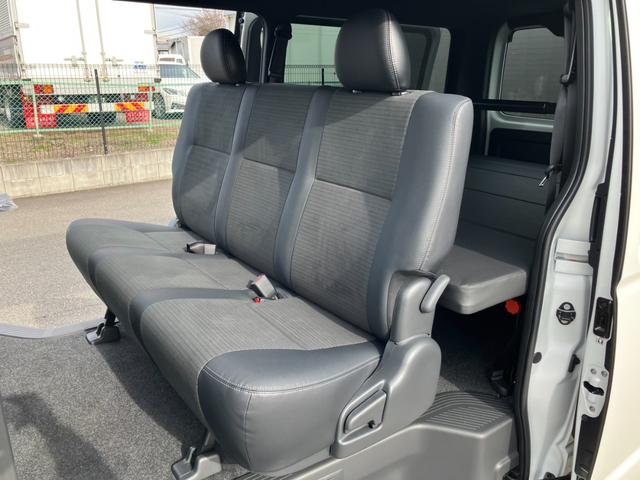 ハイエースバン ロングスーパーＧＬ　ダークプライムＳ　登録済未使用車／４ＷＤ／寒冷地／ＡＬＰＩＮＥ　ＢＩＧＸ／ＨＤＭＩ／Ｂカメラ／ＥＴＣ／パノラミックビューモニター／デジタルインナーミラー／モデリスタフルエアロ／１６ｉｎアルミ／両側パワスラ／ベッドキット（68枚目）