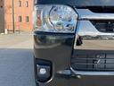 ハイエースバン スーパーGL ダークプライムII 登録済未使用車/4WD/寒冷地仕様/クリアランスソナー/AC100V電源/LEDヘッドライト/LEDフォグライト/トヨタセーフティーセンス/スマートキー/ハーフレザーシート 中古車画像_2