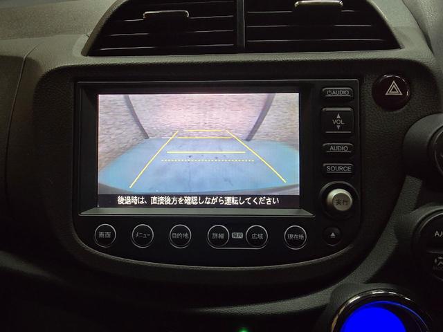 フィットシャトルハイブリッド ハイブリッド・ナビプレミアムセレクション　ハイブリッド　バックカメラ　ナビ　ＴＶ　クリアランスソナー　オートクルーズコントロール　ＨＩＤ　スマートキー　電動格納ミラー　ＣＶＴ　盗難防止システム　衝突安全ボディ　アルミホイール　ＣＤ　ＡＢＳ（4枚目）