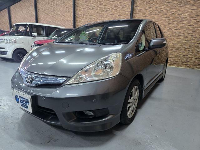 フィットシャトルハイブリッド ハイブリッド・ナビプレミアムセレクション　ハイブリッド　バックカメラ　ナビ　ＴＶ　クリアランスソナー　オートクルーズコントロール　ＨＩＤ　スマートキー　電動格納ミラー　ＣＶＴ　盗難防止システム　衝突安全ボディ　アルミホイール　ＣＤ　ＡＢＳ（14枚目）