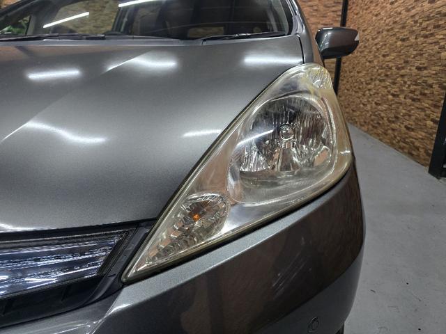 フィットシャトルハイブリッド ハイブリッド・ナビプレミアムセレクション　ハイブリッド　バックカメラ　ナビ　ＴＶ　クリアランスソナー　オートクルーズコントロール　ＨＩＤ　スマートキー　電動格納ミラー　ＣＶＴ　盗難防止システム　衝突安全ボディ　アルミホイール　ＣＤ　ＡＢＳ（49枚目）