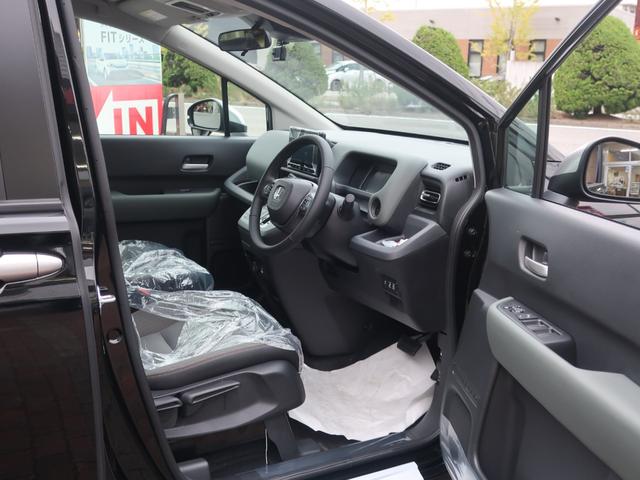フリード e:HEVクロスター 新車未登録 ディーラーオプション装着車(8インチコネクトナビ ETC車載器 FRドラレコ) ホンダセンシング ブラインドスポットインフォメーション 運転席助手席シートヒーター 15AW(9枚目)