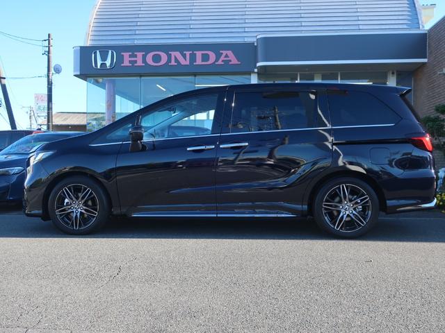 オデッセイハイブリッド ｅ：ＨＥＶアブソルート・ＥＸ　新車未登録　ディーラーオプション装着車（１１．４インチホンダコネクトナビ）ホンダセンシング　運転席＆助手席・２列目パワーシート＋シートヒーターパワーテールゲート　トリプルゾーンコントロールエアコン（7枚目）